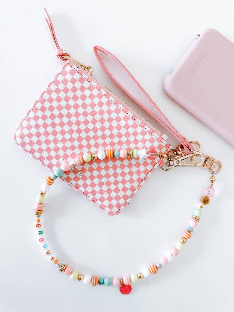 The Caep Pink Checkered Snap Wallet