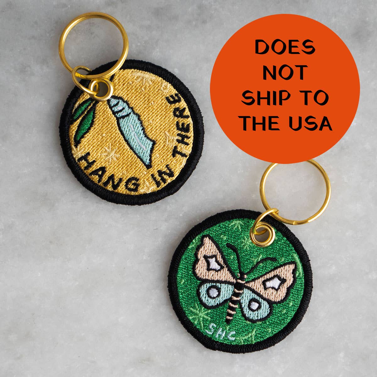 Hang in There (Cocoon) Double-Sided Embroidered Keychain